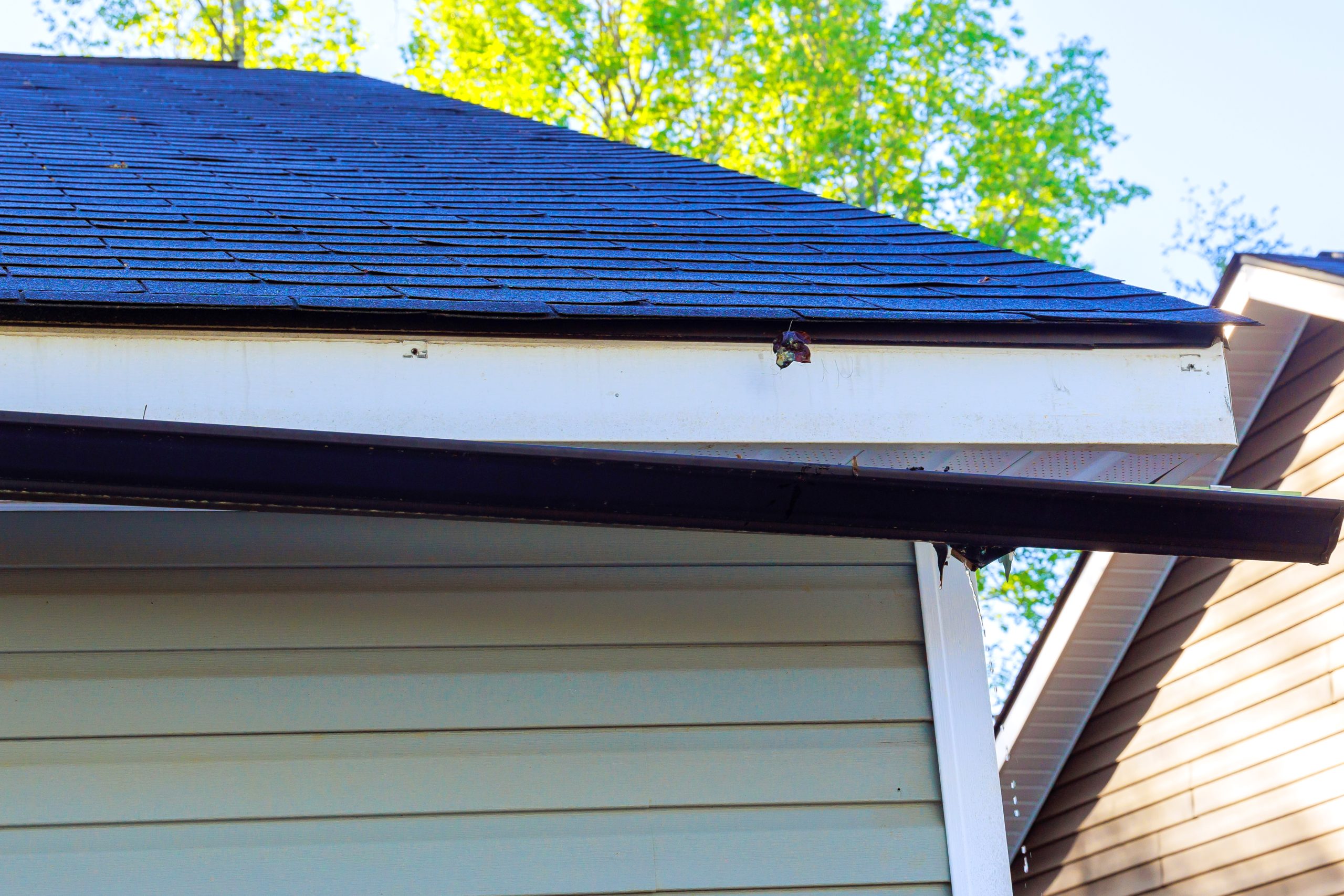 Broken gutter on garage Broken gutter on garage